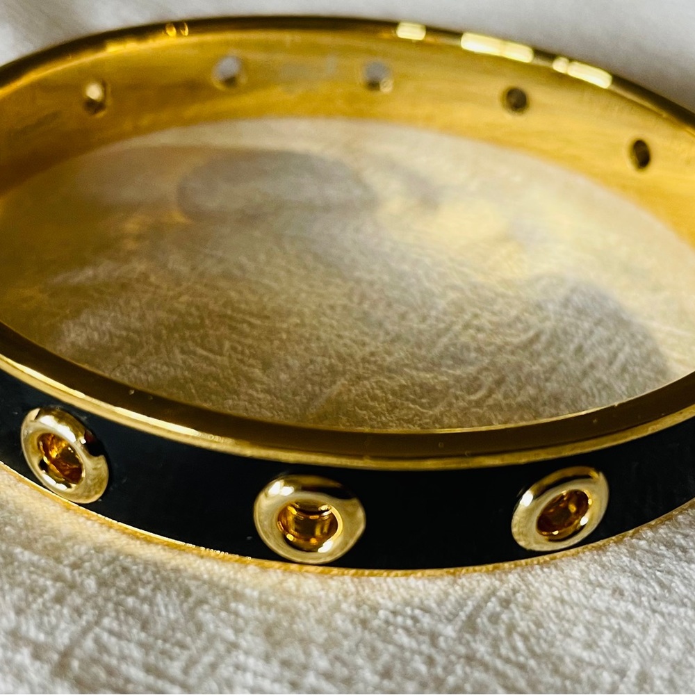 Coach yellow gold and black bangle bracelet